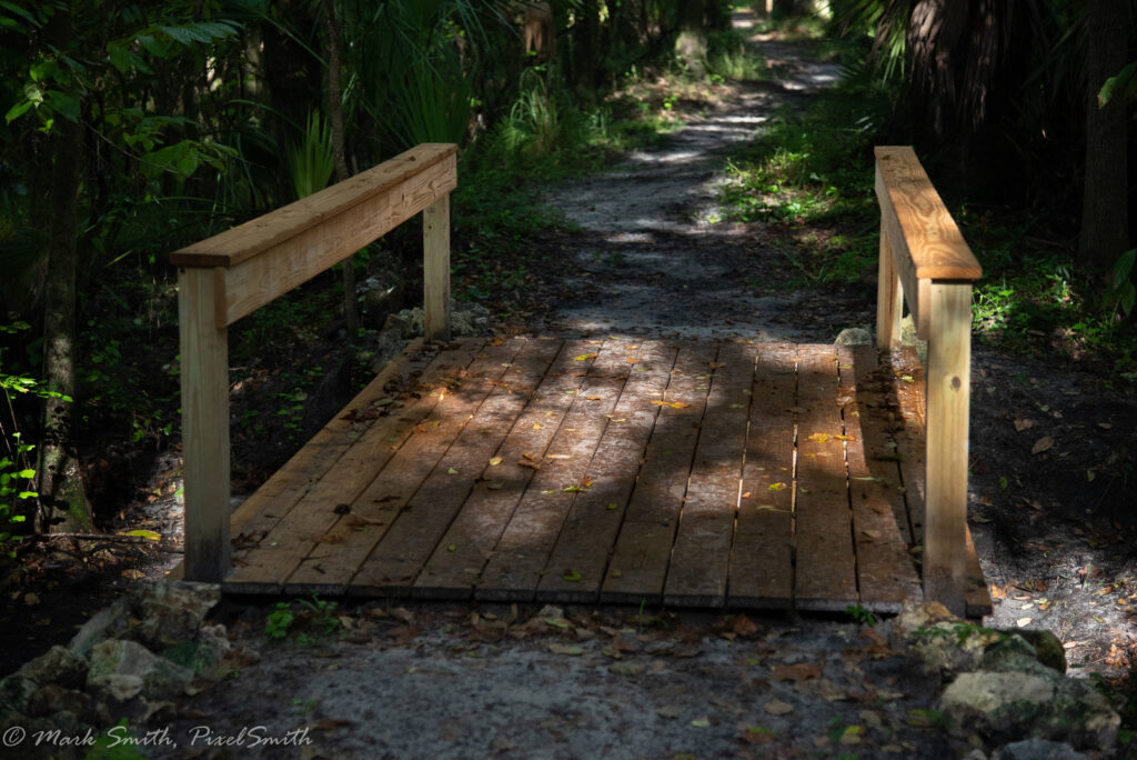 Bridge #2 freshly built with natural lumber — before staining — photo by Mark Smith, PixelSmith