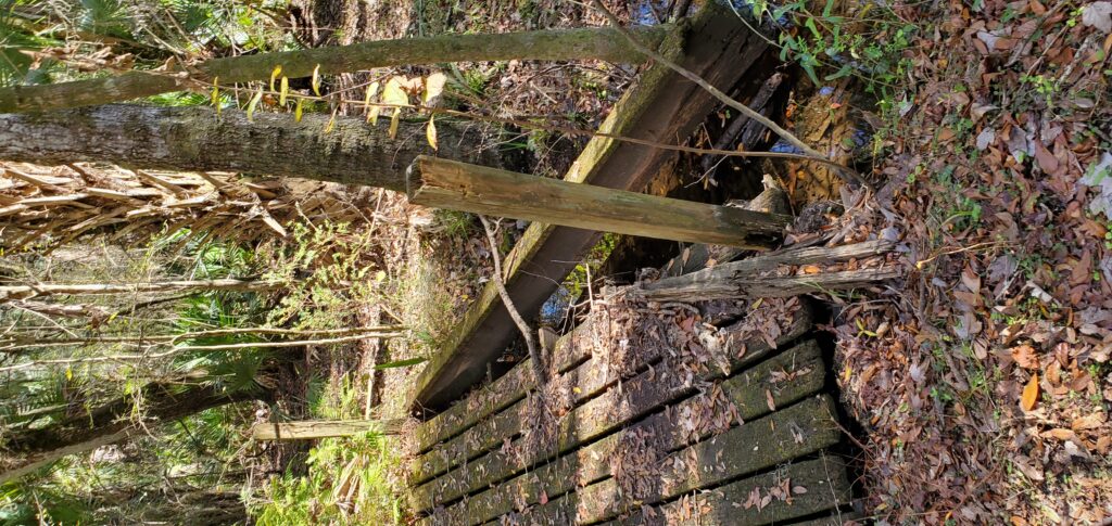 Bridge #2 showing collapsed post and deteriorated structure