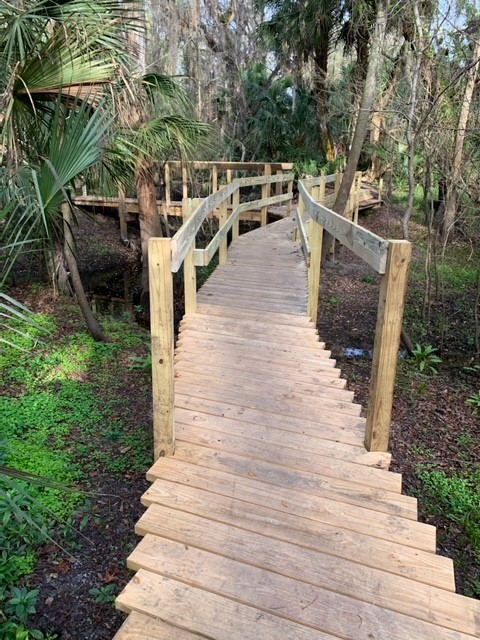 Volunteers installing railings on the Radio Crossing bridge structure